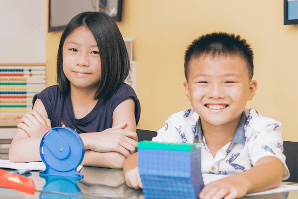 Students learning Singapore Math with teacher